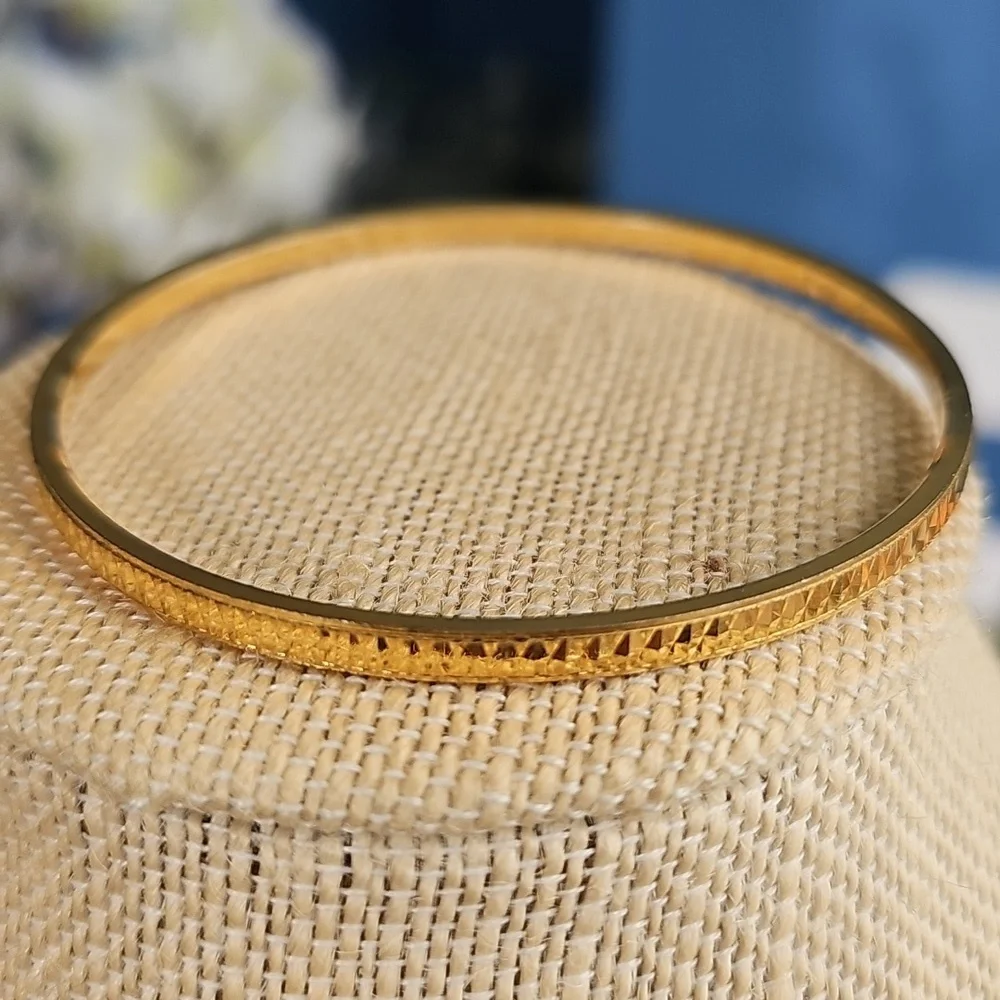 Trifari Elegant Gold Tone Bangle Bracelet